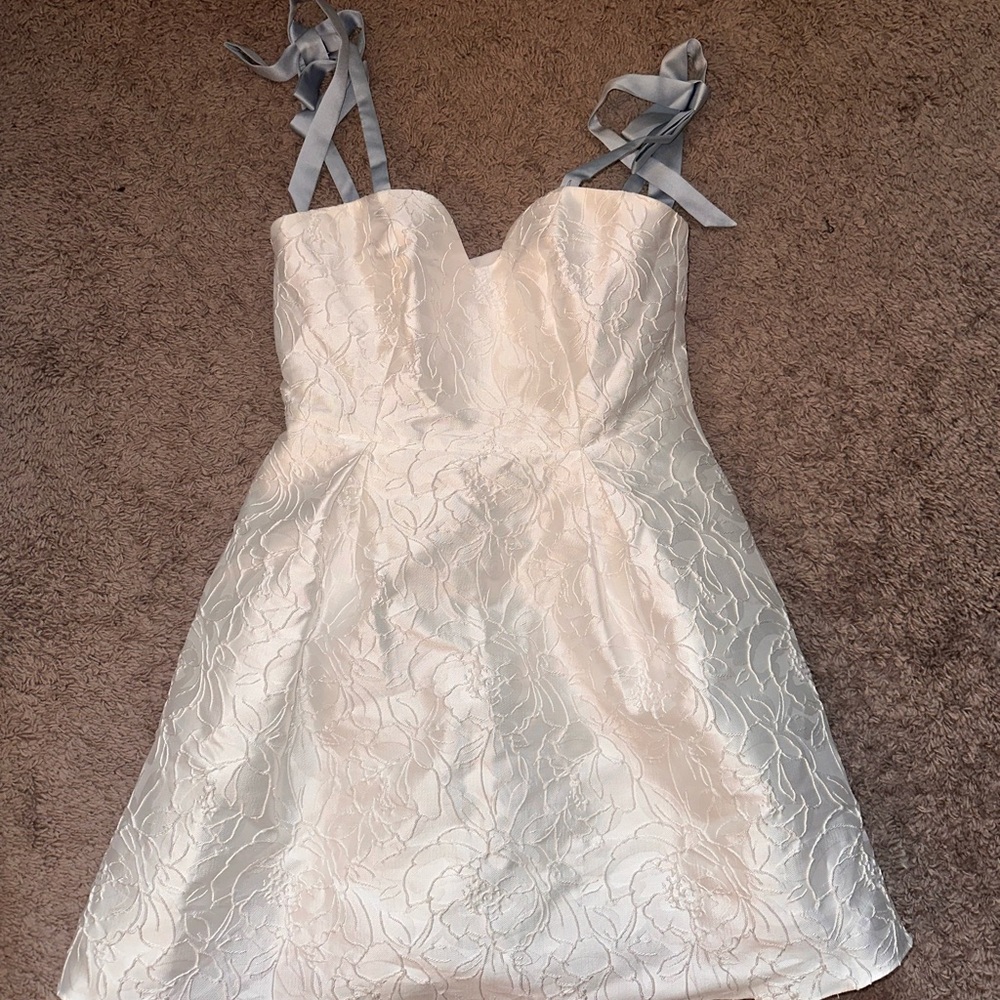 Elegant White Wedding Dress with Blue Accents